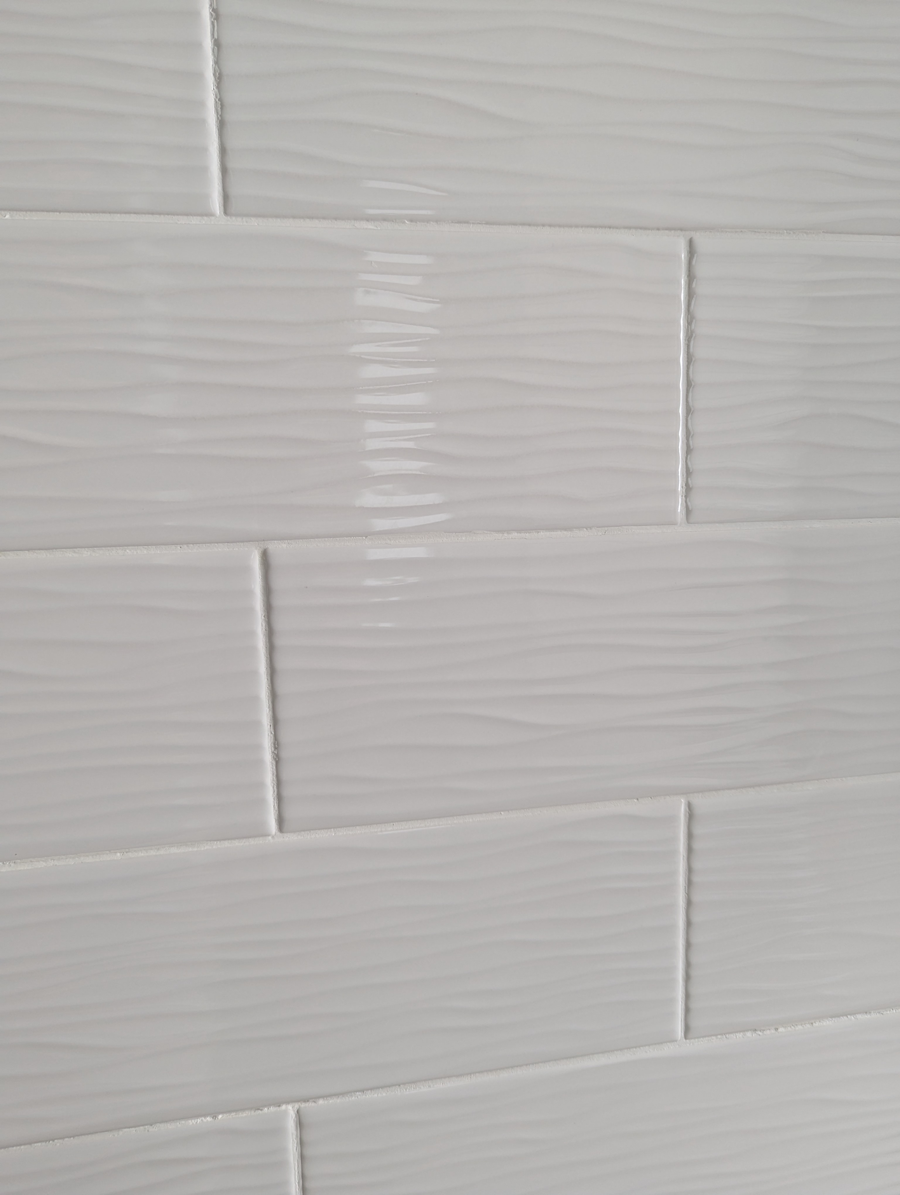 Glossy white subway tile – cleaned with non-toxic tile cleaners for kitchens and baths