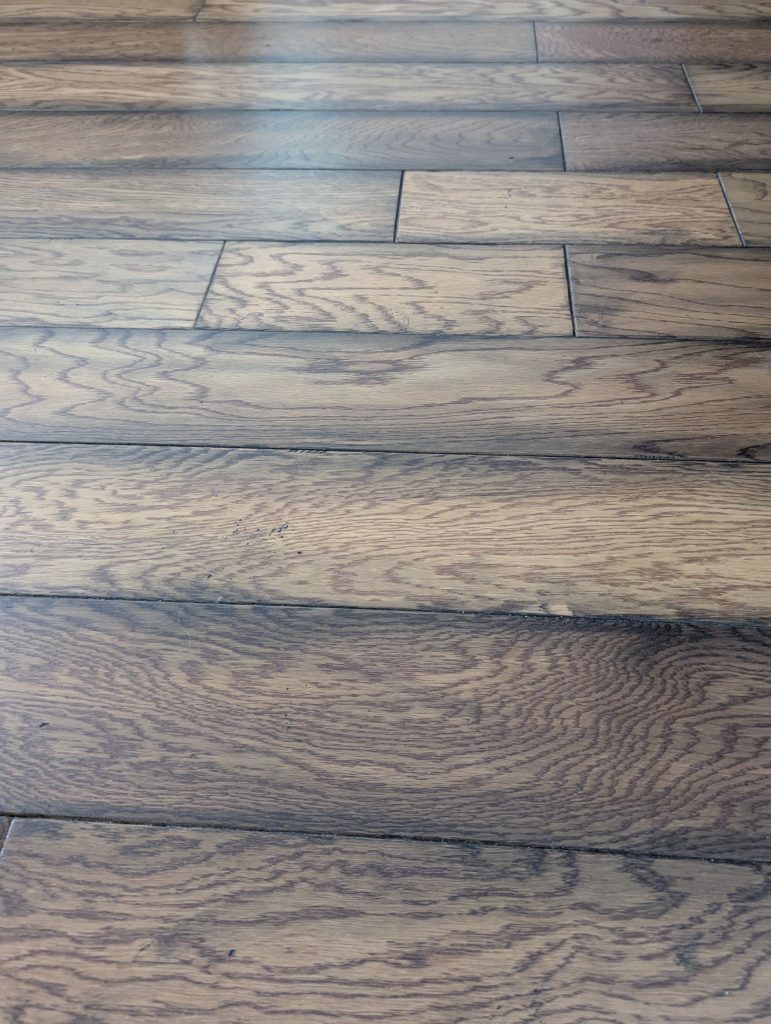 Dark wood flooring tested with the best hardwood floor cleaner for deep stains and scuffs